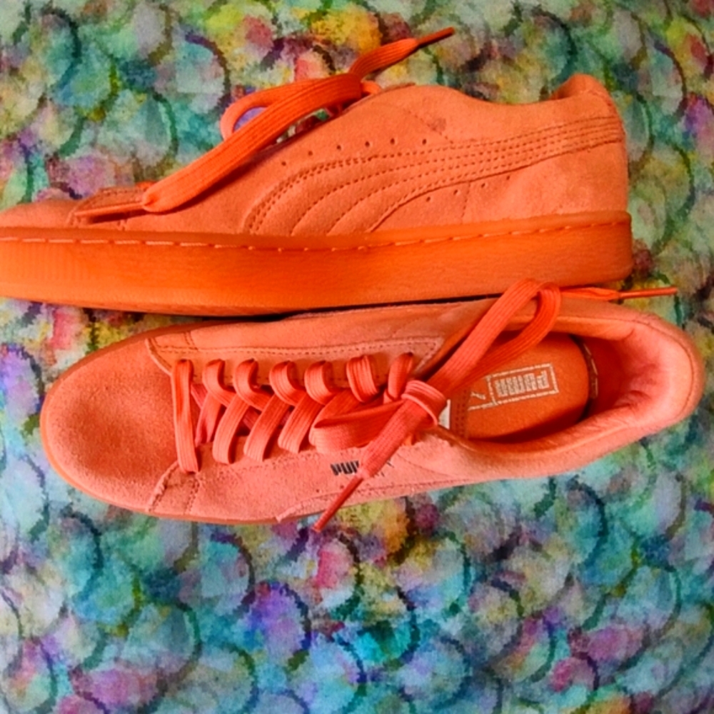 Peach suede Puma tennis shoes